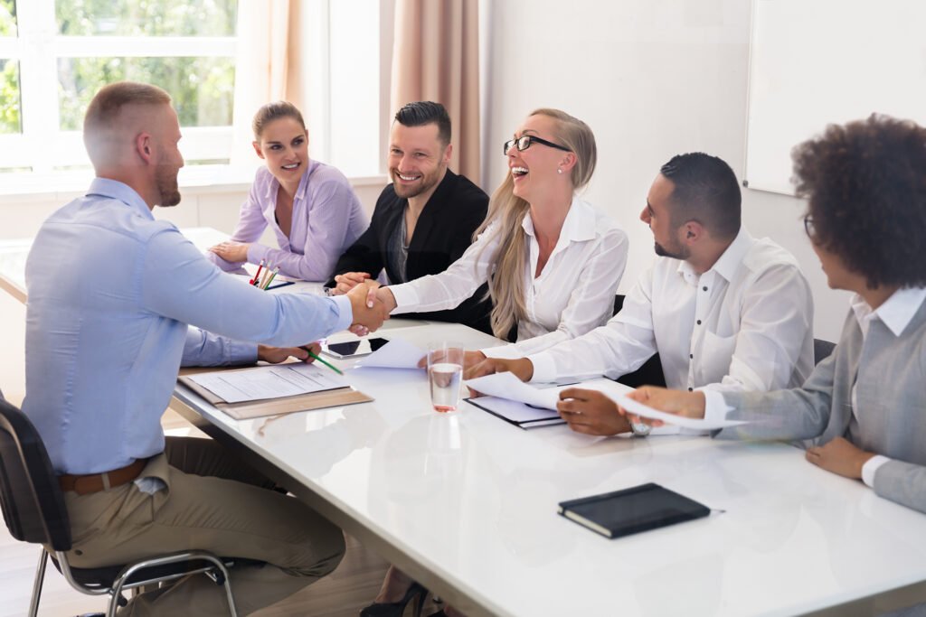 A team conducting interviews or candidate assessments in a professional setting